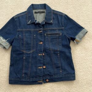 Button up Jean shirt or jacket.  Can be worn either way. Cuffed short sleeve